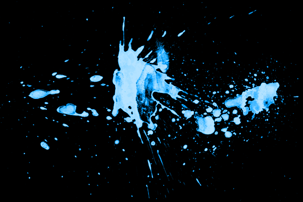 Splatter brush used as paint in UV light Splatter brush used as paint in UV light